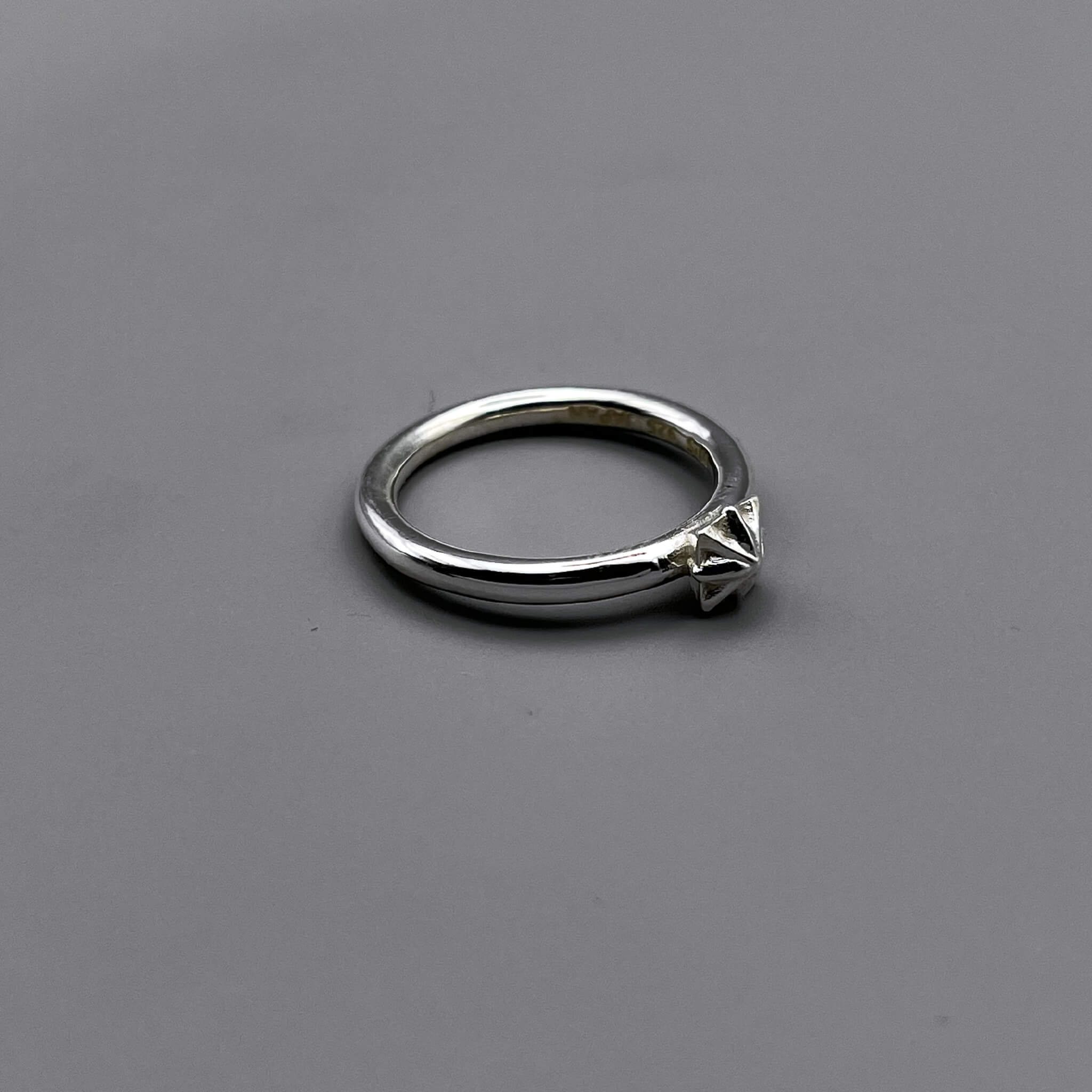 TRIPLE X STUDS SOLITIRE RING
