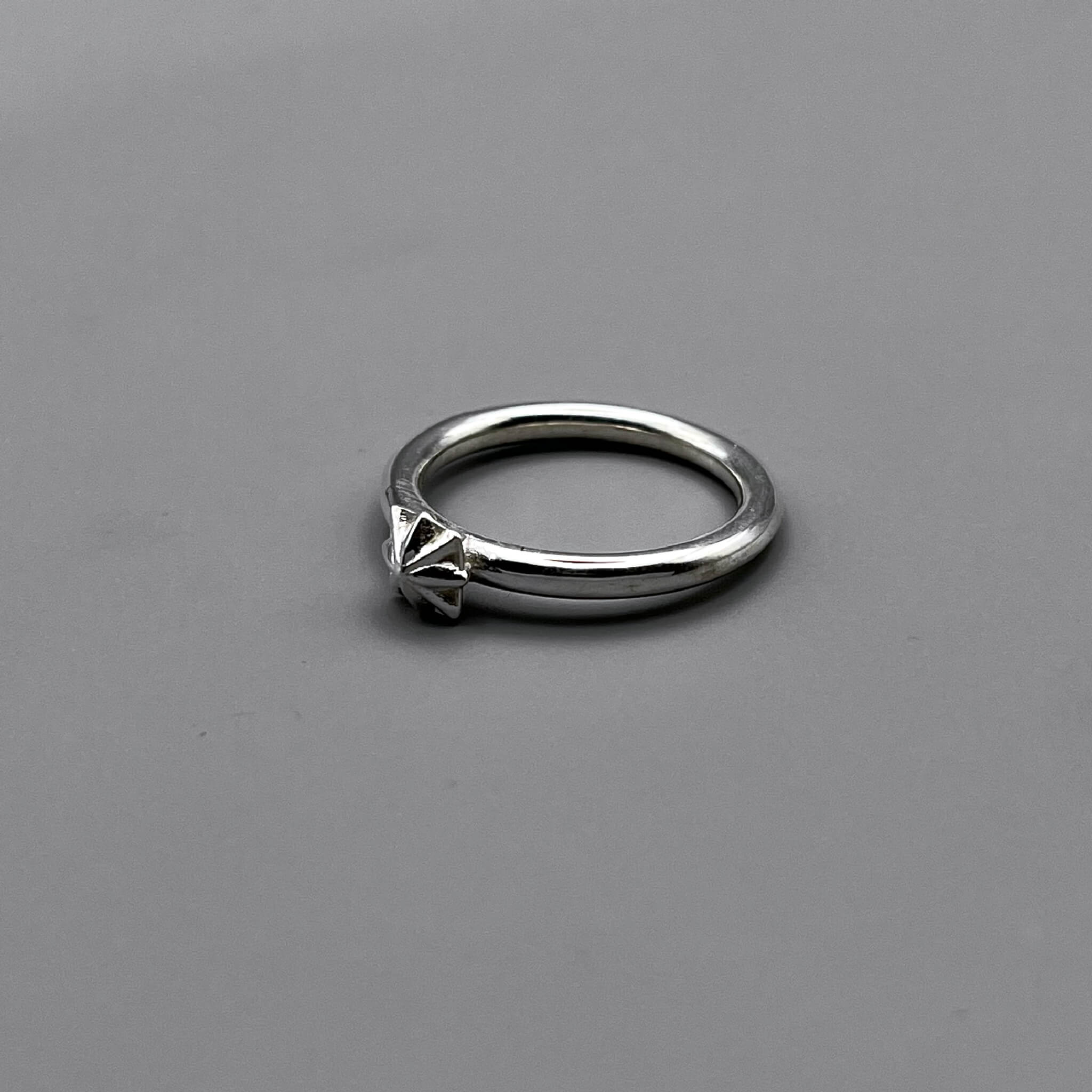 TRIPLE X STUDS SOLITIRE RING